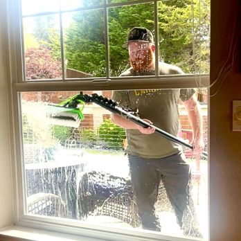 Crystal Clear Window Care - Chris using his "pure" water machine to clean the outside windows. No streaks! - Window Washing Near Me - Eureka, California