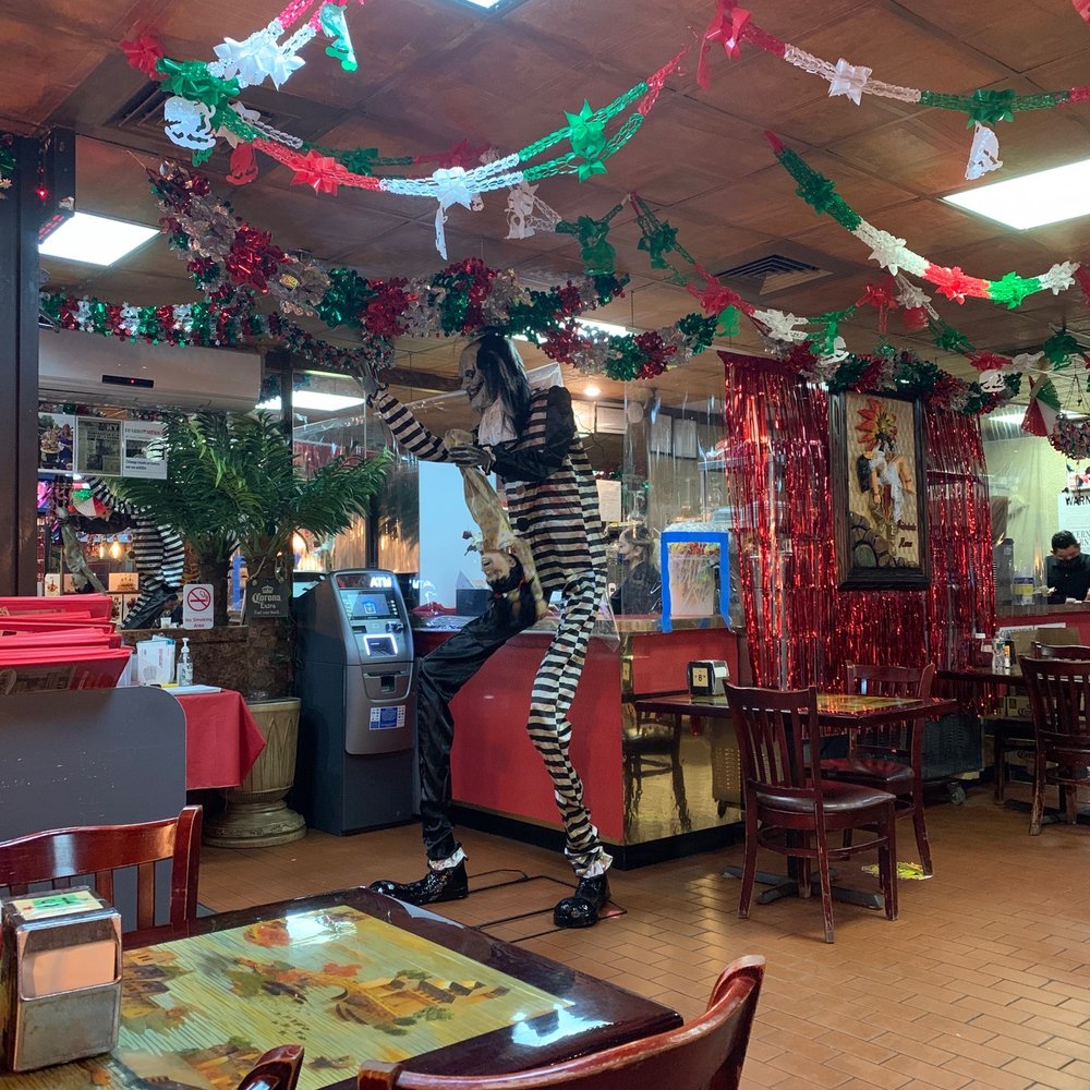 Michelada House II - Hostess at the entrance welcoming you - Mexican Near Me - Jackson Heights, New York Michelada House II - Hostess at the entrance welcoming you - Mexican Near Me - Jackson Heights, New York
