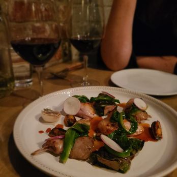 L'Abattoir - Pictured: main dish of Thiessen Farm quail with smoked and grilled foie gras with stone fruit, Tokyo turnips, and escarole (1 of 2). - French Near Me - Vancouver, British Columbia L'Abattoir - Pictured: main dish of Thiessen Farm quail with smoked and grilled foie gras with stone fruit, Tokyo turnips, and escarole (1 of 2). - French Near Me - Vancouver, British Columbia