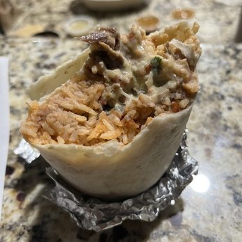 Freebirds World Burrito - Brisket burrito with queso is the bussin! - Tex-Mex Near Me - Allen, Texas Freebirds World Burrito - Brisket burrito with queso is the bussin! - Tex-Mex Near Me - Allen, Texas
