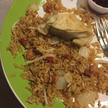 Oriental Chinese - A dumpling and some pork fried rice - Chinese Near Me - Somerville, Massachusetts