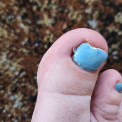 EZ Nail & Spa - The left part of nail was cut badly and bled. They put a green solution on. Hope I don't get an infection.