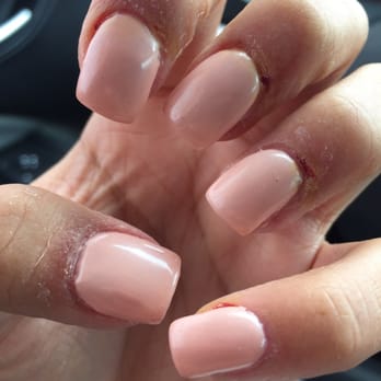 Epic Nails - She cut my fingers not once or twice but about 9 times! To top it off it took her almost 3 HOURS to make this mess! NEVER AGAIN! - Nail Salons Near Me - San Fernando, California