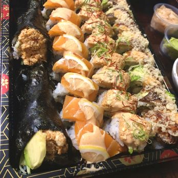 Gorilla Eats Sushi - Left to right - 2 (HR) Spicy Tuna Hand Roll $6-7, Ritz Roll ($16), The Tiger Roll ($16), Dragon Roll ($17.50) - Sushi Bars Near Me - San Diego, California Gorilla Eats Sushi - Left to right - 2 (HR) Spicy Tuna Hand Roll $6-7, Ritz Roll ($16), The Tiger Roll ($16), Dragon Roll ($17.50) - Sushi Bars Near Me - San Diego, California