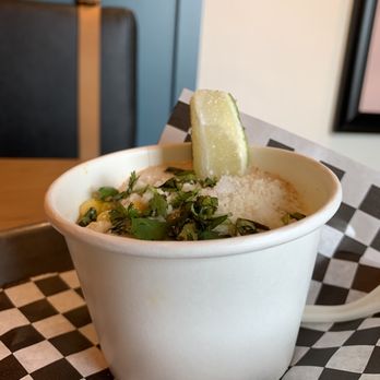 El Jefe Taco Joint - Street Corn in a Cup (Esquites)-  Caramelized sweet corn, tossed with house sauce and spices, cilantro, cotija cheese and fresh lime. - Tacos Near Me - Anchorage, Alaska