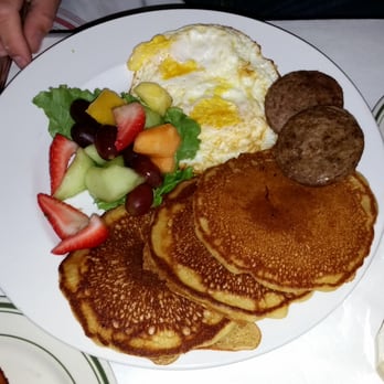 Tarrant's West - 2 eggs and pancakes with sausage and fruit. Again, huge portions and it was delicious! - American Near Me - Richmond, Virginia Tarrant's West - 2 eggs and pancakes with sausage and fruit. Again, huge portions and it was delicious! - American Near Me - Richmond, Virginia