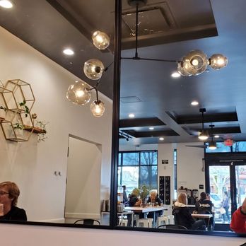 The Press - Shot was taken in mirror on back wall.  View of of the front door and the modern decor. - Coffee & Tea Near Me - Livermore, California