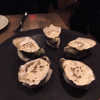 L'Abattoir - Baked Pacific oysters. Similar to oyster motoyaki with a Pacific Northwest flavour - French Near Me - Vancouver, British Columbia