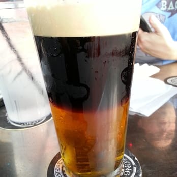 Vortex Bar & Grill - The Black Skull - Eventide Dry Irish Stout with Laughing Skull Amber Ale. - American Near Me - Atlanta, Georgia Vortex Bar & Grill - The Black Skull - Eventide Dry Irish Stout with Laughing Skull Amber Ale. - American Near Me - Atlanta, Georgia