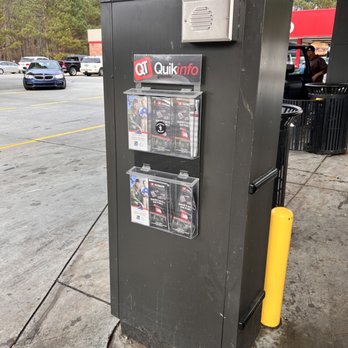 QuikTrip - a newspaper dispenser at a gas station - Gas Stations Near Me - Douglasville, Georgia