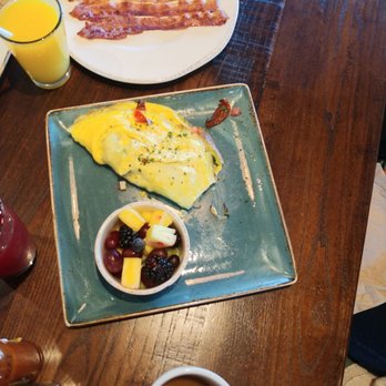 First Watch - An omelette with spinach and feta and various other vegetables with fresh fruit on the side - Breakfast & Brunch Near Me - Louisville, Kentucky First Watch - An omelette with spinach and feta and various other vegetables with fresh fruit on the side - Breakfast & Brunch Near Me - Louisville, Kentucky