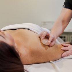 Ethereal Hot Stone Massage with soothing warmth of heated basalt stones