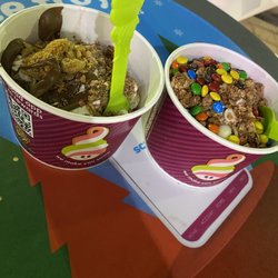 Menchie's Frozen Yogurt - Plain w/ nutella, granola and butterfinger. Pineapple + plain w/granola, m&m and butterfinger.