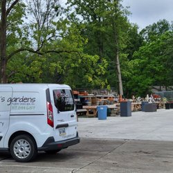 Rosie’s Gardens & Hughes Landscape - Front entrance. With nice selection of containers and benches.