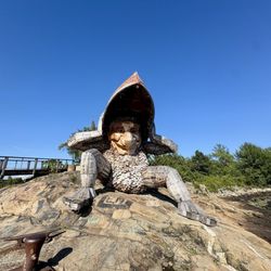 Providence E-Bike Rentals - Troll sculpture along path
