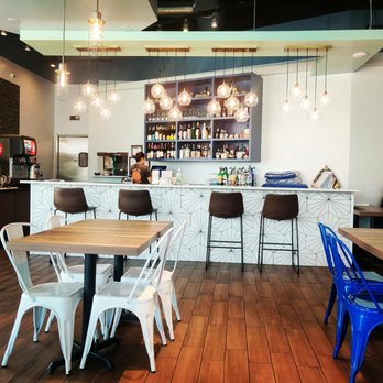 Spoon + Fork Thai Kitchen - the bar and dining area - Thai Near Me - McKinney, Texas Spoon + Fork Thai Kitchen - the bar and dining area - Thai Near Me - McKinney, Texas