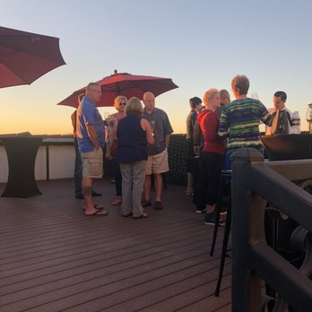 Vinum 55 - a group of people standing on a deck - Wine Tasting Room Near Me - Chandler, Arizona Vinum 55 - a group of people standing on a deck - Wine Tasting Room Near Me - Chandler, Arizona