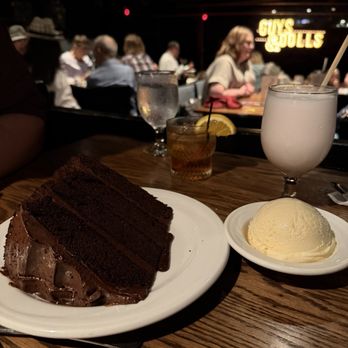 Chanhassen Dinner Theatres - Chocolate cake for two with ice cream- this is a MASSIVE piece of cake could easily be shared between three or four people. Delicious. - Dinner Theater Near Me - Chanhassen, Minnesota Chanhassen Dinner Theatres - Chocolate cake for two with ice cream- this is a MASSIVE piece of cake could easily be shared between three or four people. Delicious. - Dinner Theater Near Me - Chanhassen, Minnesota
