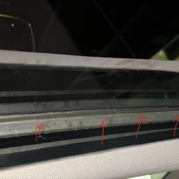 Razor blade cuts in window frame Razor blade cuts in window frame