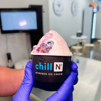 Chill-N Nitrogen Ice Cream - Winter Park - a hand holding a tub of ice cream - Desserts Near Me - Winter Park, Florida Chill-N Nitrogen Ice Cream - Winter Park - a hand holding a tub of ice cream - Desserts Near Me - Winter Park, Florida