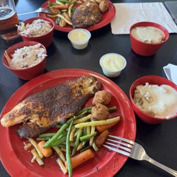 Blackened catfish with mashed potatoes & white gravy, stir fried veggies, coleslaw and of course a Shiner beer. Blackened catfish with mashed potatoes & white gravy, stir fried veggies, coleslaw and of course a Shiner beer.