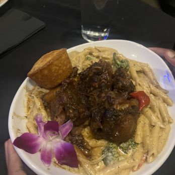 Noir Kitchen & Cocktails - Rasta pasta with oxtails. - Soul Food Near Me - Nashville, Tennessee Noir Kitchen & Cocktails - Rasta pasta with oxtails. - Soul Food Near Me - Nashville, Tennessee