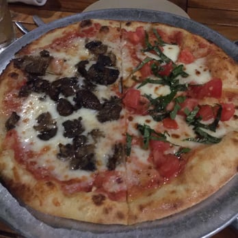Monkeypod Kitchen - Half mushroom/ half margherita pizza - Hawaiian Near Me - Kapolei, Hawaii Monkeypod Kitchen - Half mushroom/ half margherita pizza - Hawaiian Near Me - Kapolei, Hawaii