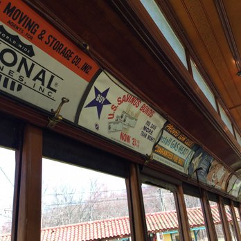Connecticut Trolley Museum - Old advertising on open trolley - Museums Near Me - East Windsor, Connecticut