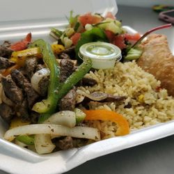 Jd'licious Food  Truck - A plate full of flavor steak with pepper and onions side of rice