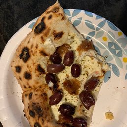 Bianca pizza with black olives Bianca pizza with black olives