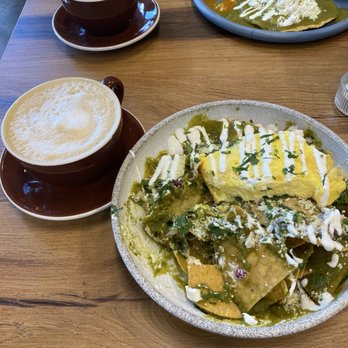 La Ciudad - Chilequiles verde with canela soul latte. Huevos divorciados in the back - Breakfast & Brunch Near Me - West Sacramento, California La Ciudad - Chilequiles verde with canela soul latte. Huevos divorciados in the back - Breakfast & Brunch Near Me - West Sacramento, California