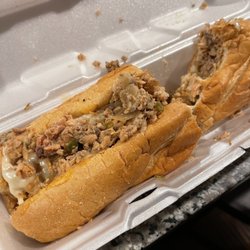 The Philly Cheesesteak Cafe - The Salmon Steak Specialty
