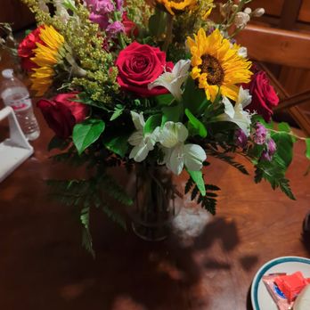 Beavercreek Florist - These were the flowers delivered. 4 roses and 3 sunflowers and filler for $268.75 - Florists Near Me - Dayton, Ohio Beavercreek Florist - These were the flowers delivered. 4 roses and 3 sunflowers and filler for $268.75 - Florists Near Me - Dayton, Ohio
