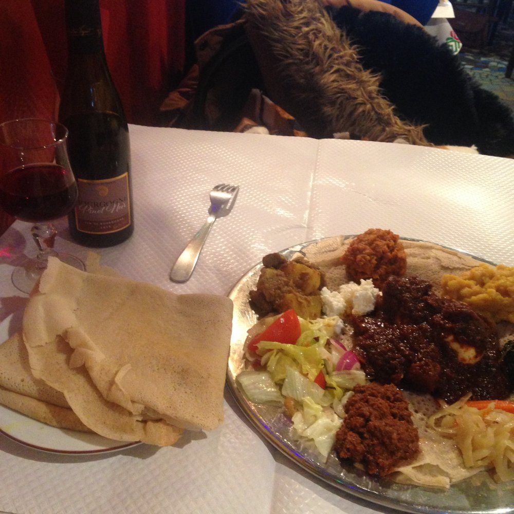 The very generous and delicious sampler platter for one plus my half bottle of wine. The very generous and delicious sampler platter for one plus my half bottle of wine.