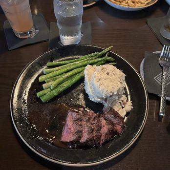 Reunion Kitchen + Drink - Prime Flat Iron Steak, partially eaten and Shoestring Fries - New American Near Me - Brea, California Reunion Kitchen + Drink - Prime Flat Iron Steak, partially eaten and Shoestring Fries - New American Near Me - Brea, California
