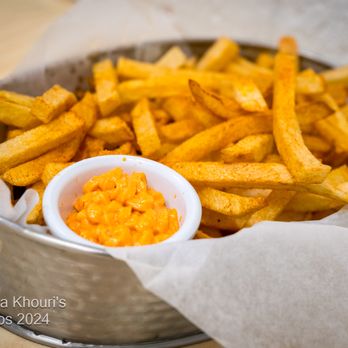Mamma Khouri's - French Fries ·
Fried Fresh-Cut Potatoes, Seasoned with Paprika, Salt,
Garlic, and Black Pepper Mix, with Toom Ketchup Dip - Middle Eastern Near Me - Portland, Oregon Mamma Khouri's - French Fries ·
Fried Fresh-Cut Potatoes, Seasoned with Paprika, Salt,
Garlic, and Black Pepper Mix, with Toom Ketchup Dip - Middle Eastern Near Me - Portland, Oregon