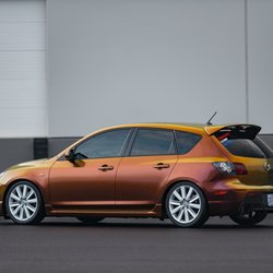 Mazdaspeed done in a Gloss Fresh Spring color flow vinyl wrap.