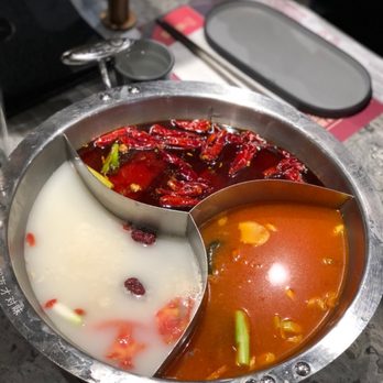 Liuyishou Hotpot - From left to right to top: Pork Bone Soup base, Tom Yum Soup base and Traditional Spicy Soup base. - Hot Pot Near Me - Richmond Hill, Ontario Liuyishou Hotpot - From left to right to top: Pork Bone Soup base, Tom Yum Soup base and Traditional Spicy Soup base. - Hot Pot Near Me - Richmond Hill, Ontario