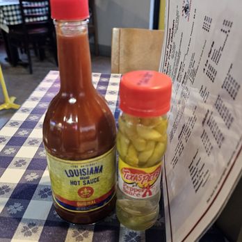 Gus’s World Famous Fried Chicken - Camelback - Table hot sauces - Chicken Shop Near Me - Phoenix, Arizona Gus’s World Famous Fried Chicken - Camelback - Table hot sauces - Chicken Shop Near Me - Phoenix, Arizona