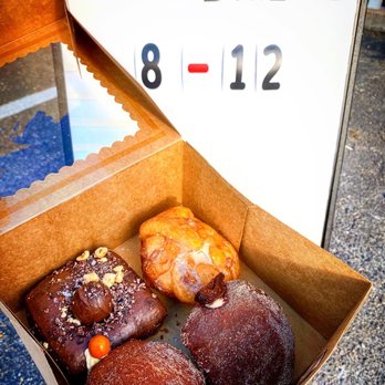 Good Bread Bake Shop - The Fall Pack - Clockwise from top: Glazed Cinnamon Apple Fritter, Fig Cream, Pumpkin Spice Orange Cream Cheese, Chocolate Rye Hazelnut - Donuts Near Me - Denver, Colorado Good Bread Bake Shop - The Fall Pack - Clockwise from top: Glazed Cinnamon Apple Fritter, Fig Cream, Pumpkin Spice Orange Cream Cheese, Chocolate Rye Hazelnut - Donuts Near Me - Denver, Colorado