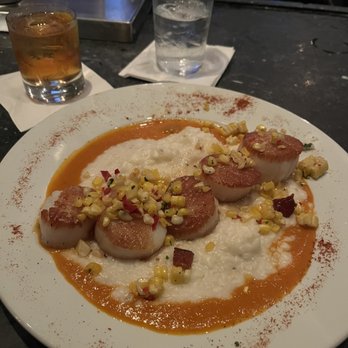 Red Drum Restaurant - Pan seared Sea scallops, red pepper coulis, creamy grits, corn and bacon salsa. - Seafood Near Me - Mount Pleasant, South Carolina