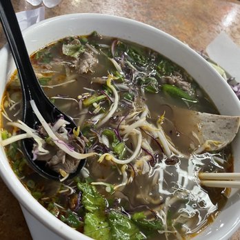 Fresh Bowl - Close up bun Bo hue with garnishes - Vietnamese Near Me - Austin, Texas