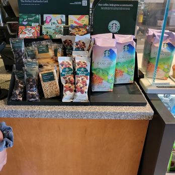 Starbucks - a display of coffee and snacks - Coffee & Tea Near Me - Plantation, Florida