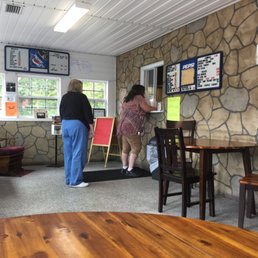 two people standing at a table