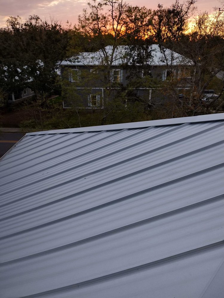 Slide of T-Roys Relief Roofing