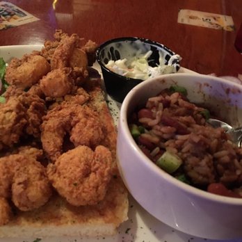 Buzzard Billy's - Sad looking po boy and tiny coleslaw - added a side of rice and beans for 3 bucks - best thing on the plate. - American Near Me - La Crosse, Wisconsin