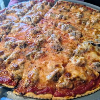 D'Agostino's Pizza and Pub - Large sausage mushroom pizza on Wednesday half price pizza deal. - Pizza Near Me - Niles, Illinois D'Agostino's Pizza and Pub - Large sausage mushroom pizza on Wednesday half price pizza deal. - Pizza Near Me - Niles, Illinois