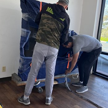 Sunshine Moving Services - Unloading the piano off the dolly - Movers Near Me - San Diego, California