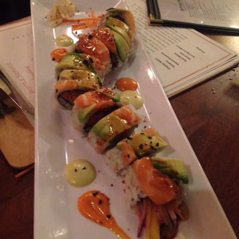 Anju Above - Mega roll. Sushi explosion. Tasty blend of textures and flavors. - Asian Fusion Near Me - Bloomington, Illinois Anju Above - Mega roll. Sushi explosion. Tasty blend of textures and flavors. - Asian Fusion Near Me - Bloomington, Illinois