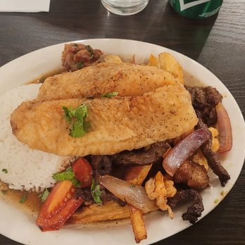 Baileys Peruvian Cuisine - The Saltado coronau.  Shrimp,chicken & beef saltado with a fried piece of fish on top. - Peruvian Near Me - Whittier, California